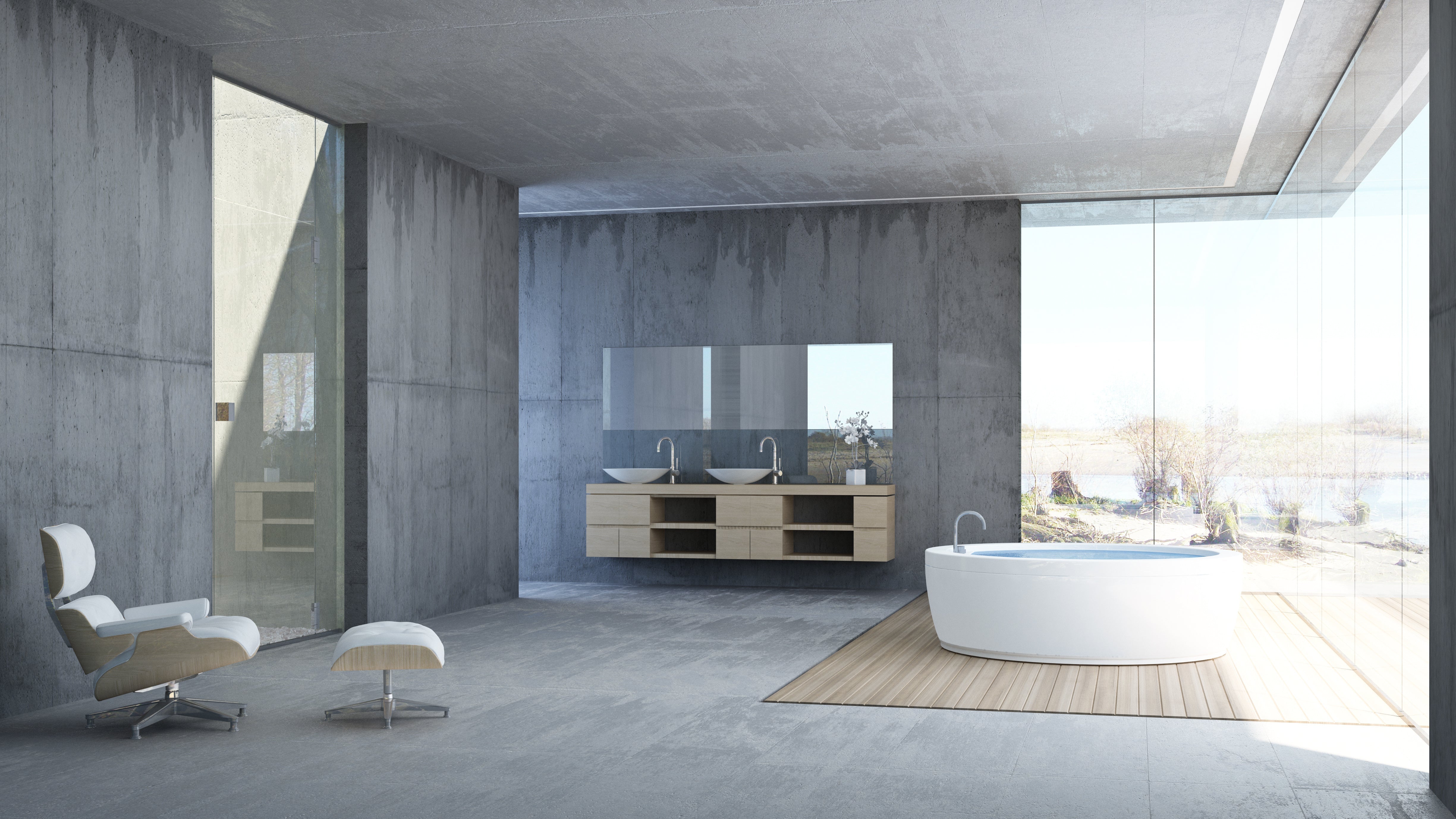 Minimalistisches, modernes Badezimmer mit einem großen, rahmenlosen Badezimmerspiegel über einem Doppelwaschtisch sowie bodentiefen Glasflächen und einer freistehenden Badewanne – ideal zur Präsentation hochwertiger moderner Spiegel.